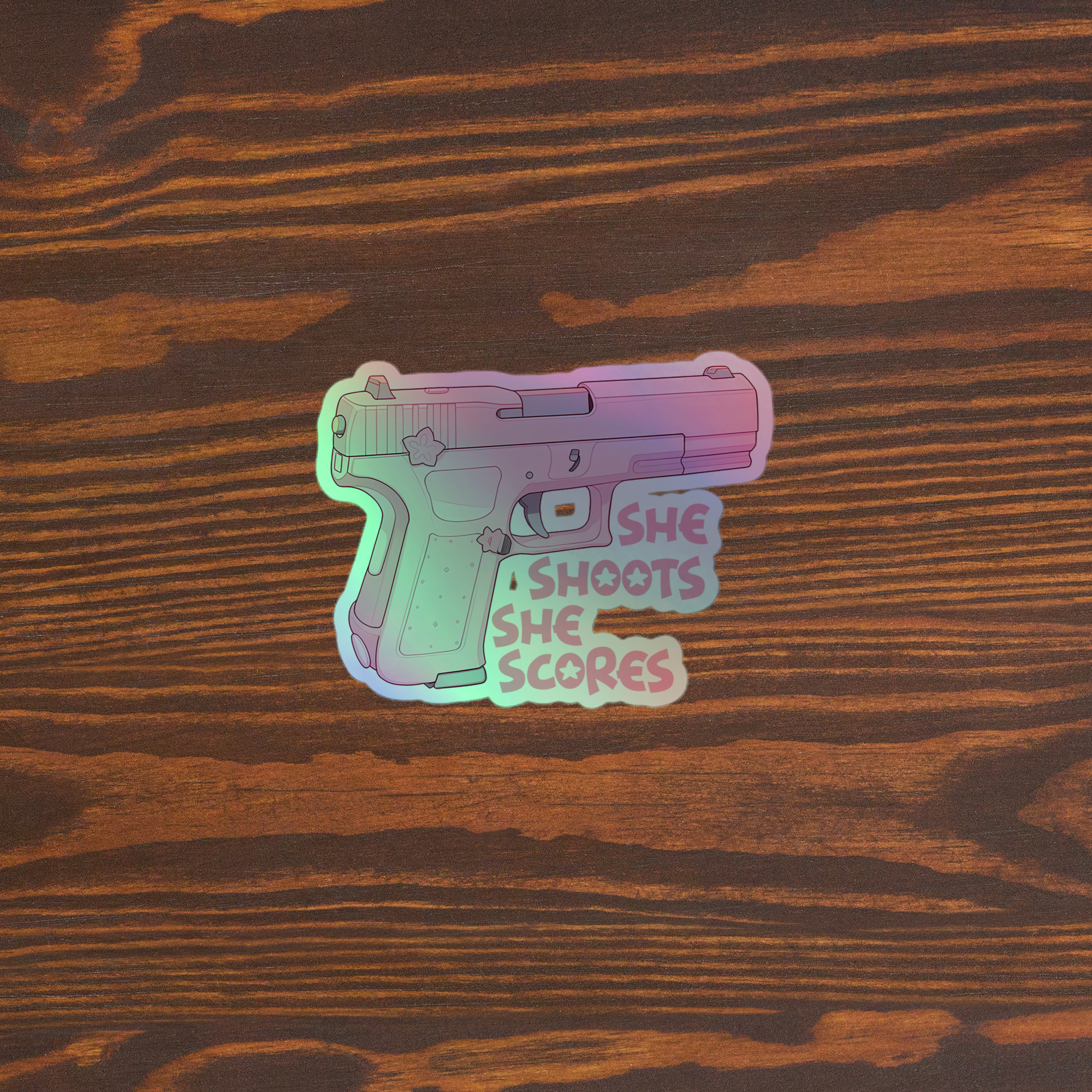 “She Shoots, She Scores” Holo Sticker 🔫✨ - Image 3