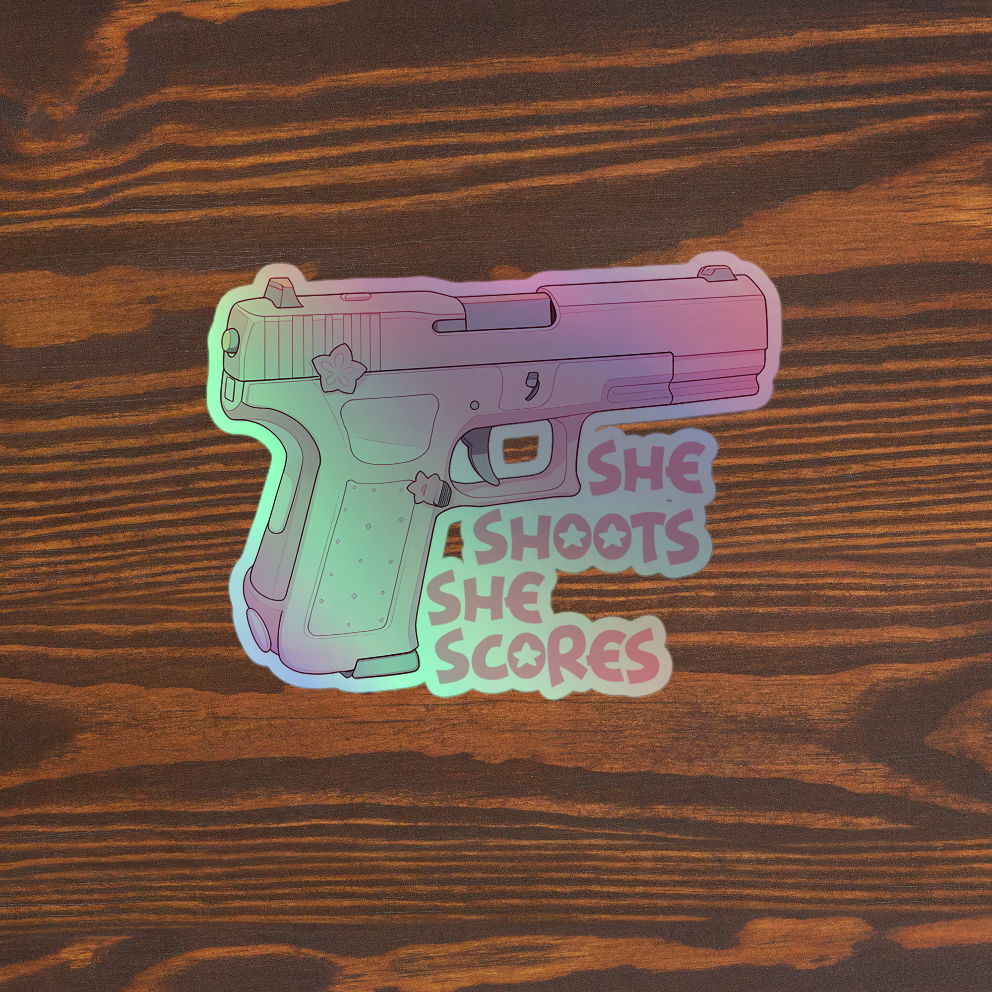 “She Shoots, She Scores” Holo Sticker 🔫✨
